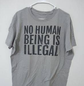 "NO HUMAN BEING IS ILLEGAL" Activist T-shirt